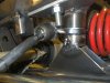 Other end of steering rod pushes a triangel shaped disc who push a almost horizontal strut sprin.JPG