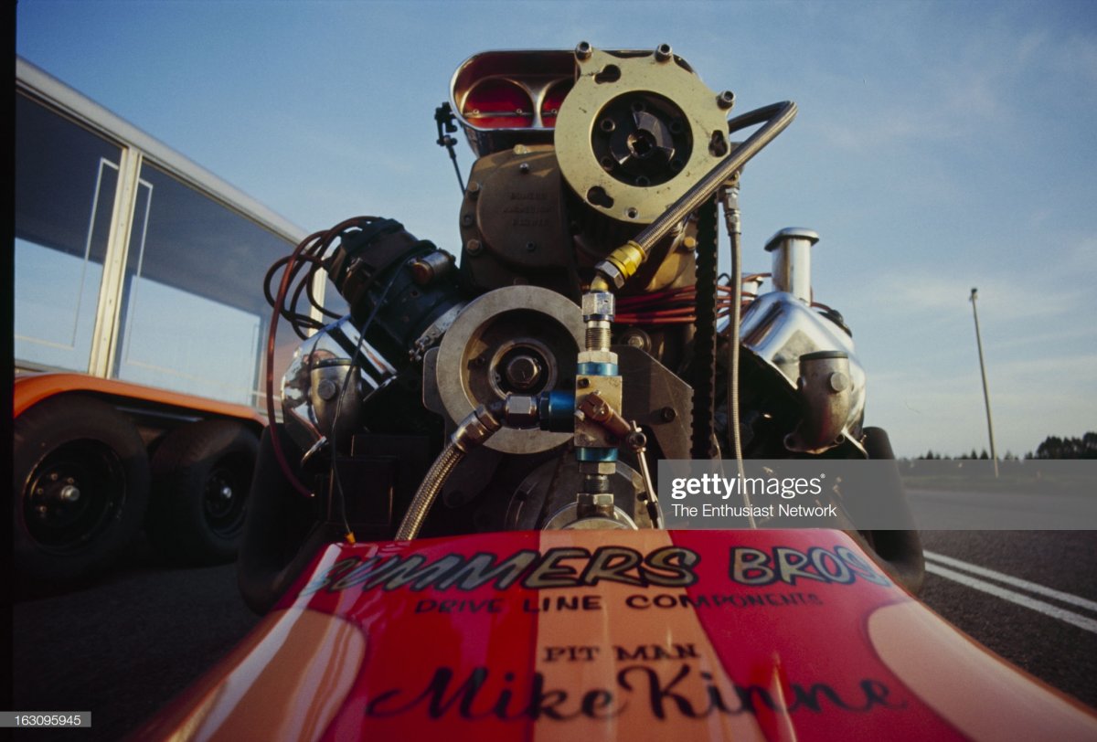 1  Tommy Ivo With Dragster. Tommy Ivo lights it up in his slingshot dragster2 hemi.jpg