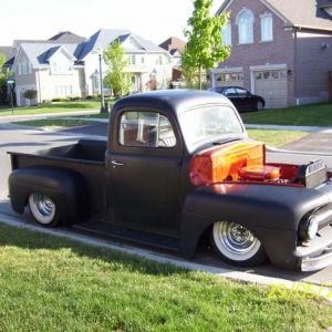 51 merc, built and sold,  It's know flat orange with black scallops and located in Austin Texas