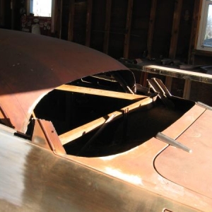Pic of the back window cut out and the roof laid down.