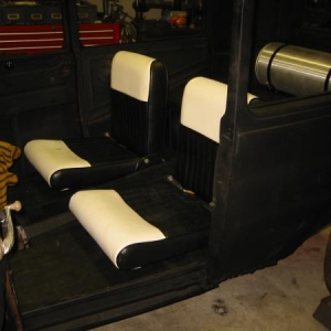 wood floor panels. jump seats. and a spun tank.