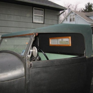 done and covered. Johnny did the rear window work and someone else did the material.