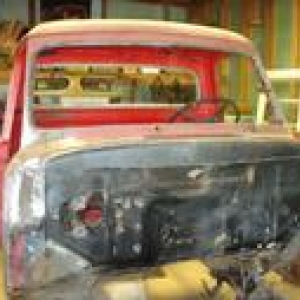 This cab is ate up on the bottom, the rest of the sheetmetal was useable, we kept the roof from this one in case we decide to chop the black one.
