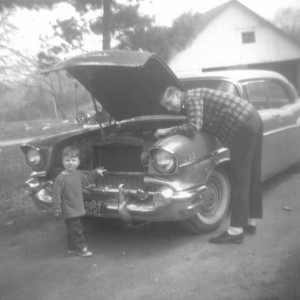 Me and Uncle Bob in April 1965 with my Grandpa's 57 Chevy he bought new. Bob was back from the Army and got the car from my Grandpa. He was tuning it up on after his brothers had used it. Mom told me he was  having hand him wrenchs/screw drivers and teaching me what they were and what their names were. Yea I was all of 3 on here. Never too early to start!
