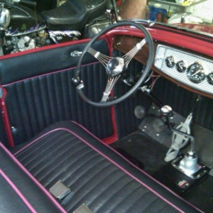 Interior was stiched by a friend and wrapped on panels made from 1/8" plastic sign material.  Drum base pedal for the gas pedal and the seat was from a Doddge Caravan (center seat).