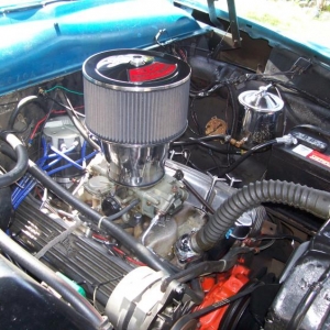 327 Bored .060 over, "492" fuelie heads, 11:1 compression,780 cfm Holley vacuum carb. HEI ignition, Isky cam, balanced engine, Frantz toilet paper oil filter.