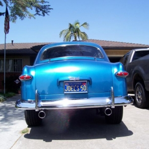 custom headers, 2 1/2 in. exhaust, with Flowmaster mufflers.