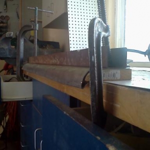 Forming a replacement panel to re-skin the lower exterior of the passenger side door