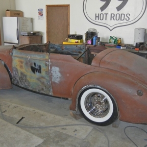 Top cut off, longer sedan doors fitted. No turning back now!