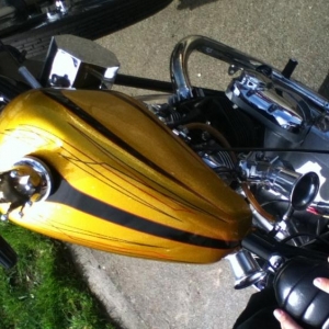 Shot of my Triumph Tank. Custom cap made by my dad, and a wicked paint job by Mike Taylor.