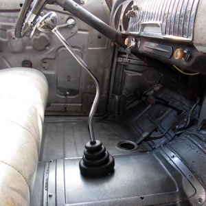 This fixed the problem... a Hurst short throw assembly and a 16" Lokar shift lever... much better...