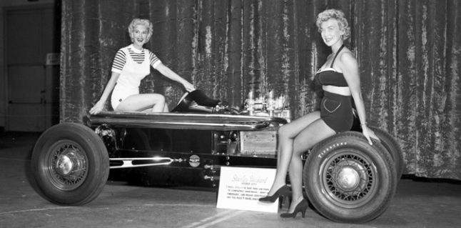 One Show with Two Girls Sitting on Three Hot Rods…